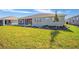 Spacious backyard with covered patio and screened enclosure at 9757 Sw 79Th Lane Rd, Ocala, FL 34481