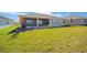 Spacious backyard with covered patio and screened enclosure at 9757 Sw 79Th Lane Rd, Ocala, FL 34481