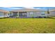 Large backyard with covered patio and screened enclosure at 9757 Sw 79Th Lane Rd, Ocala, FL 34481