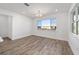 Bright dining room with wood-look floors and a chandelier at 9757 Sw 79Th Lane Rd, Ocala, FL 34481