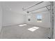 Spacious garage with concrete floor and two windows at 9757 Sw 79Th Lane Rd, Ocala, FL 34481