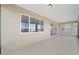 Bright screened porch with sliding glass doors leading to the kitchen at 9757 Sw 79Th Lane Rd, Ocala, FL 34481