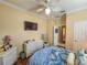 Spacious bedroom with a queen-size bed and built-in wardrobe at 12152 Se 91St Ave, Summerfield, FL 34491