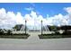 Grand entrance to community with a large fountain at 12152 Se 91St Ave, Summerfield, FL 34491