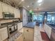 Spacious kitchen with island, stainless steel appliances, and breakfast nook at 12152 Se 91St Ave, Summerfield, FL 34491