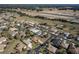 Aerial view of homes in a neighborhood near a highway at 15750 Sw 11Th Court Rd, Ocala, FL 34473