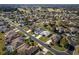 Aerial view of a residential neighborhood showcasing homes and landscaping at 15750 Sw 11Th Court Rd, Ocala, FL 34473