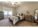 Spacious bedroom with plush carpet and ample natural light at 15750 Sw 11Th Court Rd, Ocala, FL 34473
