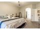 Spacious bedroom with large bed, ample closet space, and neutral color palette at 15750 Sw 11Th Court Rd, Ocala, FL 34473