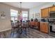 Bright breakfast nook features a round table and window seat at 15750 Sw 11Th Court Rd, Ocala, FL 34473