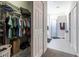 Walk-in closet with shelving and hanging space, easily accessible from the bathroom at 15750 Sw 11Th Court Rd, Ocala, FL 34473