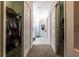 Walk-in closet with double doors and plenty of shelving and hanging space at 15750 Sw 11Th Court Rd, Ocala, FL 34473