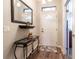 Bright and airy entryway with a console table and a large mirror at 15750 Sw 11Th Court Rd, Ocala, FL 34473