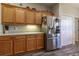 Kitchen features stainless steel appliances and oak cabinets at 15750 Sw 11Th Court Rd, Ocala, FL 34473