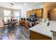 Eat-in kitchen with stainless steel appliances and wood cabinets at 15750 Sw 11Th Court Rd, Ocala, FL 34473