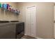 Laundry room with washer, dryer, and shelving at 15750 Sw 11Th Court Rd, Ocala, FL 34473