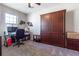 Home office with a desk, chair, and built-in wall bed at 15750 Sw 11Th Court Rd, Ocala, FL 34473