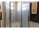 Shower stall with glass doors and neutral-colored tile at 15750 Sw 11Th Court Rd, Ocala, FL 34473