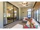 Bright sunroom with comfy seating and view of backyard at 15750 Sw 11Th Court Rd, Ocala, FL 34473