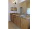 Double vanity bathroom with granite countertops at 4085 Sw 49Th Ave, Ocala, FL 34474