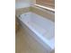 Clean and spacious bathtub with tile surround at 4085 Sw 49Th Ave, Ocala, FL 34474