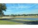 Community park with pond, walking path, and recreational facilities at 4085 Sw 49Th Ave, Ocala, FL 34474