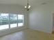 Bright dining room with large window and tile floors at 4085 Sw 49Th Ave, Ocala, FL 34474