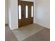 Tiled entryway with carpeted floors at 4085 Sw 49Th Ave, Ocala, FL 34474