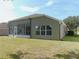 Well-maintained house exterior with screened enclosure at 4085 Sw 49Th Ave, Ocala, FL 34474