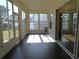 Screened patio with backyard access and seating at 4085 Sw 49Th Ave, Ocala, FL 34474