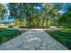 Circular community walkway with lush landscaping and homes in the background at 5004 Se 5Th Ave, Ocala, FL 34480
