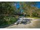 Home with a nicely landscaped front yard and paver driveway at 5004 Se 5Th Ave, Ocala, FL 34480