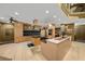 Gourmet kitchen featuring double islands, stainless steel appliances, and hardwood floors at 5004 Se 5Th Ave, Ocala, FL 34480