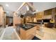 Spacious kitchen with island, stainless steel appliances, and custom cabinetry at 5004 Se 5Th Ave, Ocala, FL 34480