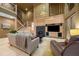 Bright living room with a cozy fireplace and built-in entertainment center at 5004 Se 5Th Ave, Ocala, FL 34480