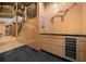 Convenient wine room with built-in storage and a wine refrigerator at 5004 Se 5Th Ave, Ocala, FL 34480