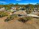 Aerial view of a single-story house with a large backyard and fenced perimeter at 5091 Ne 61St Avenue Rd, Silver Springs, FL 34488