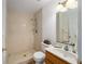 Clean bathroom with shower/tub combo and vanity at 5213 Se 114Th St, Belleview, FL 34420