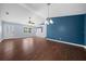 Bright dining area with wood floors and a view of the kitchen at 6225 Se 1St St, Ocala, FL 34472