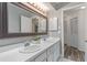 Bathroom boasts double sinks and a large vanity mirror at 8101 Nw 46Th St, Ocala, FL 34482