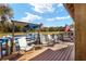 Relaxing waterfront dock with seating and boat lift at 9163 Sw 186Th Ter, Dunnellon, FL 34432