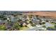 Residential neighborhood with houses and landscaping, near a marsh at 9948 Sw 69Th Ln, Ocala, FL 34481