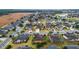 Residential neighborhood with houses and landscaping, near a marsh and golf course at 9948 Sw 69Th Ln, Ocala, FL 34481