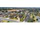 Bird's eye view of a residential neighborhood near a golf course and lake at 9948 Sw 69Th Ln, Ocala, FL 34481