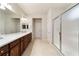 Bathroom boasts double vanity, and large walk-in shower at 9948 Sw 69Th Ln, Ocala, FL 34481