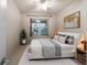 Spacious bedroom with a king-size bed and natural light at 9948 Sw 69Th Ln, Ocala, FL 34481