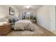 Bright bedroom with large window and hardwood floors at 9948 Sw 69Th Ln, Ocala, FL 34481