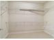 Large walk-in closet with wire shelving for ample storage at 9948 Sw 69Th Ln, Ocala, FL 34481