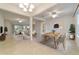 Open concept dining room, living room, and kitchen area at 9948 Sw 69Th Ln, Ocala, FL 34481