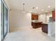 Modern kitchen with island and stainless steel appliances at 9948 Sw 69Th Ln, Ocala, FL 34481